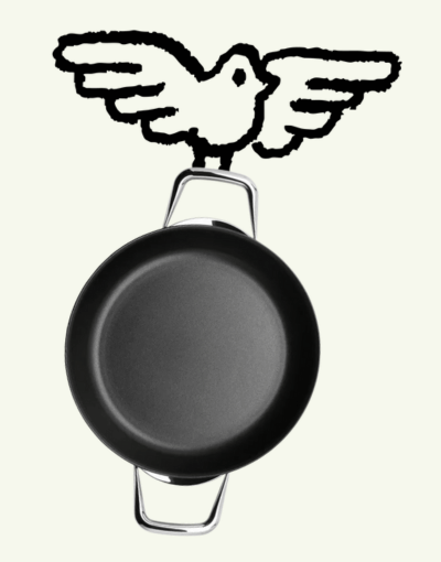 Black frying pan with a bird design on a white background
