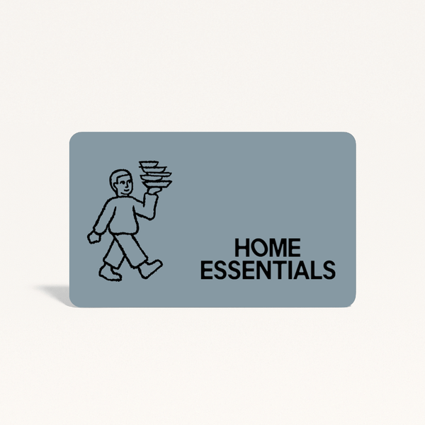 Card with a graphic of a person carrying items and the text 'HOME ESSENTIALS' on a light gray background.